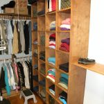 Custom designed closet space with wooden shelving