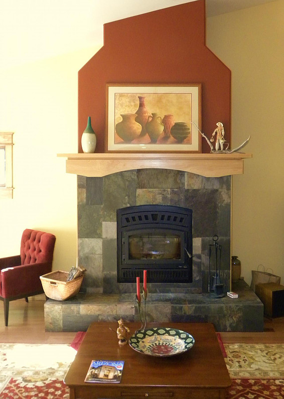 Newly remodeled fireplace with custom stone framing