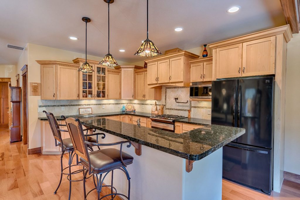 Mission Style Kitchen Cabinetry with light sealy stain