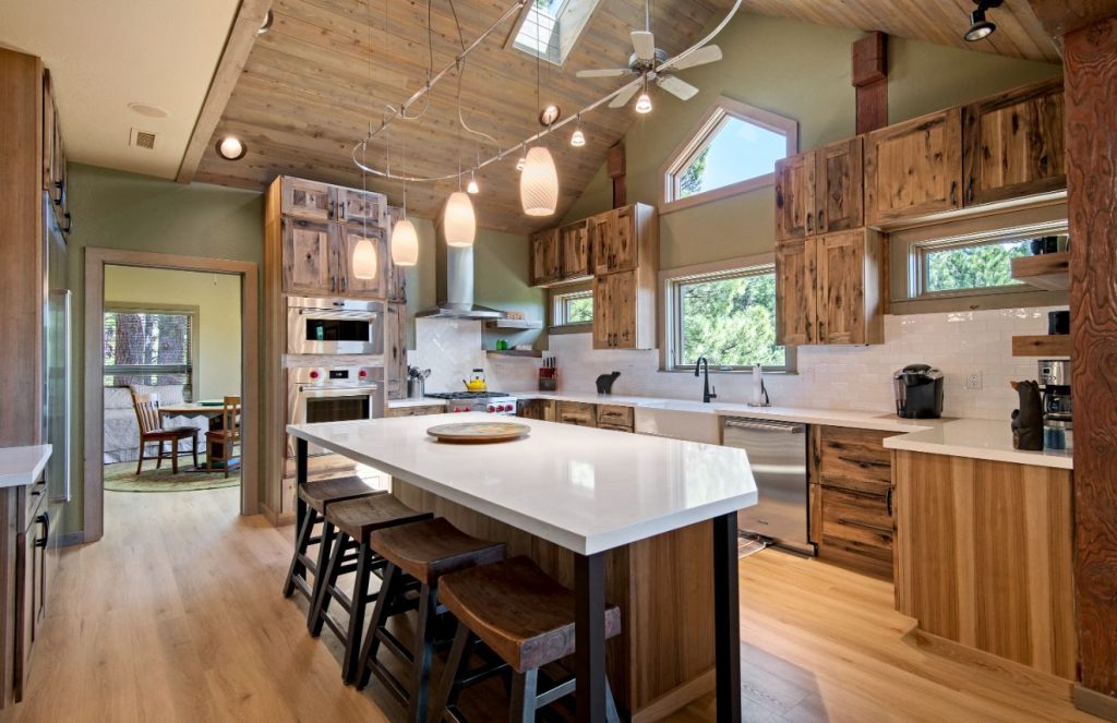 Rustic Kitchen Cabinetry with exposed knots and modern island